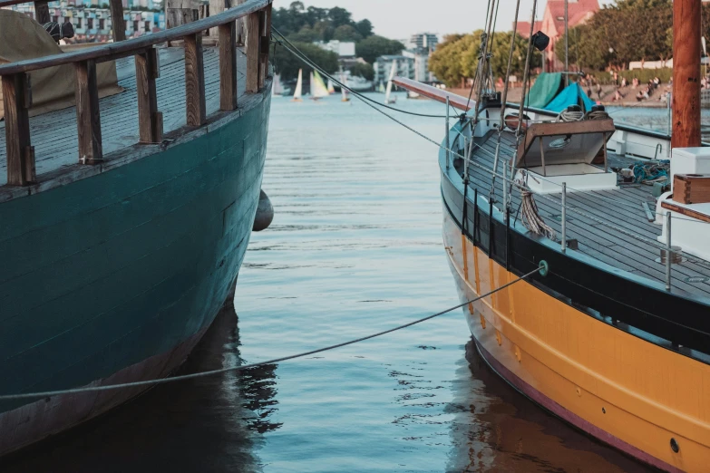 a couple of large boats in the middle of a canal