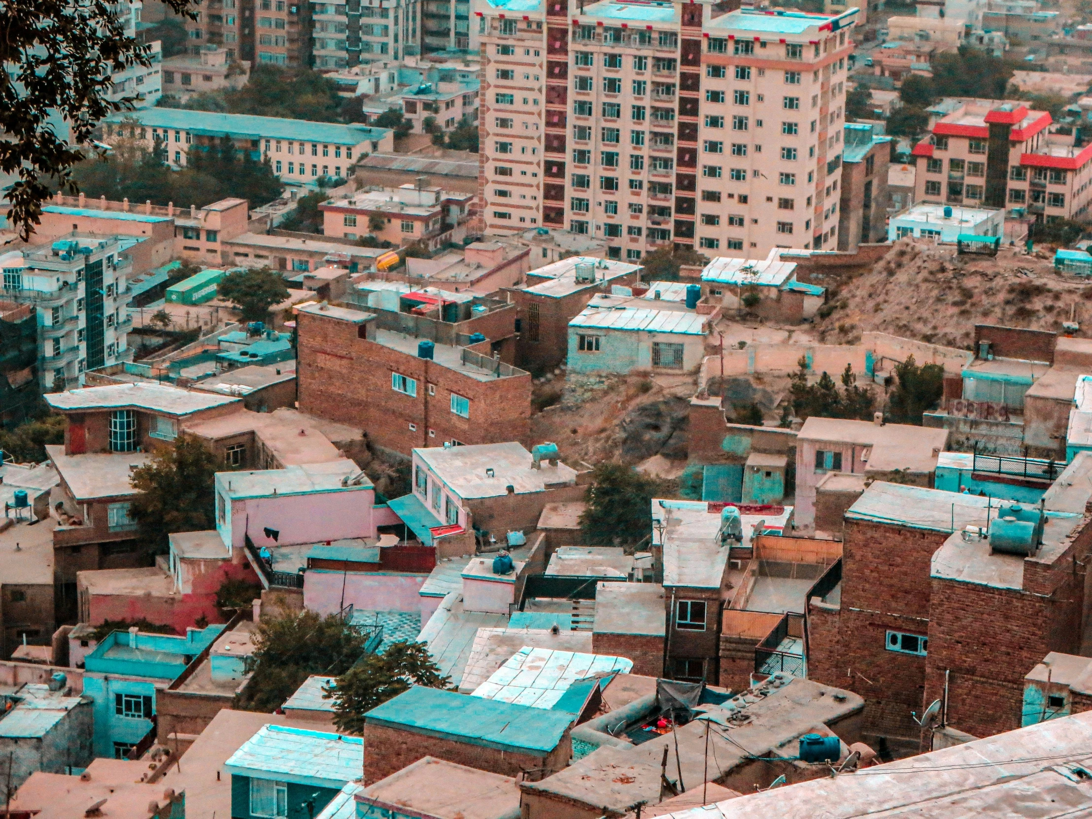 view of rooftops in the city surrounded by red brick buildings