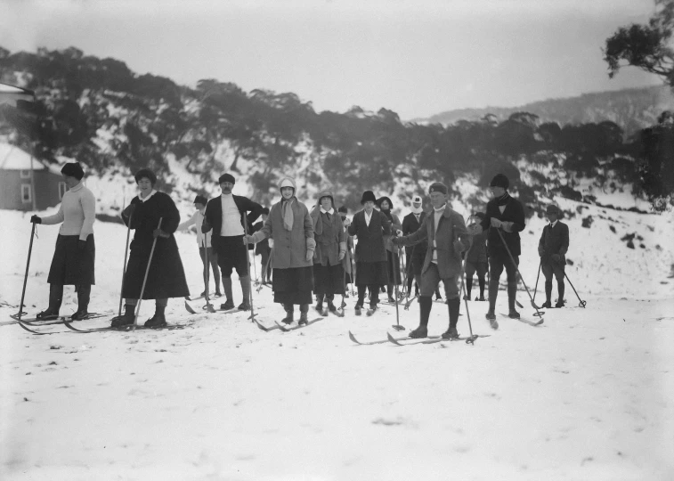 a large group of people are on the snow together