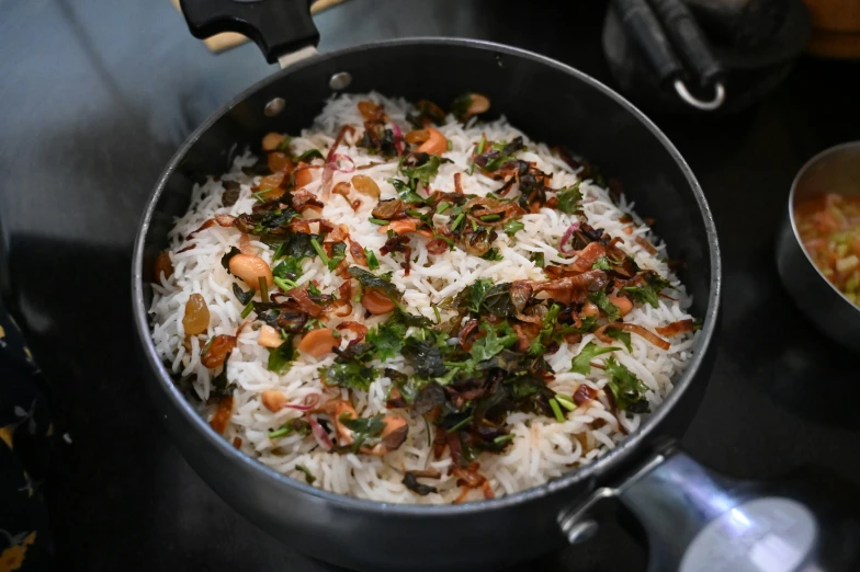 a close up of some food in a pot on a table