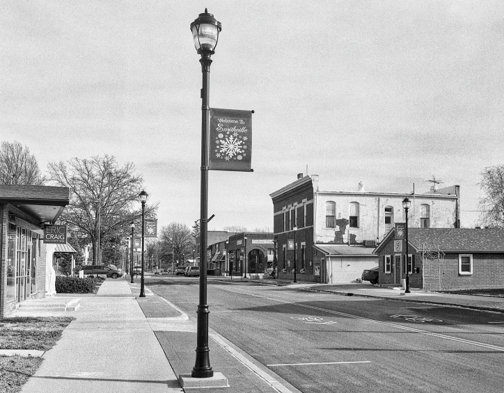 the clock on the pole is showing time 3 50