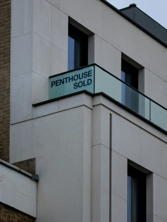 the building is next to a tall window