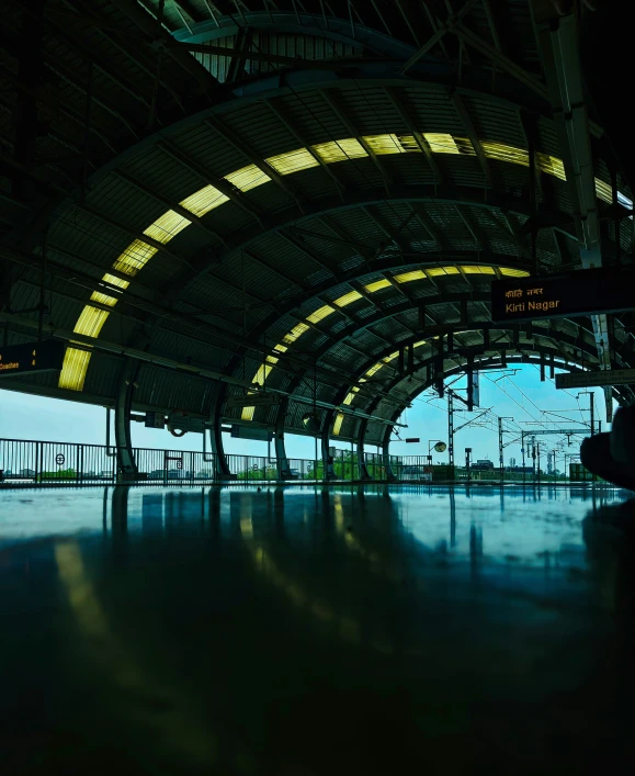 an empty swimming pool with a train station