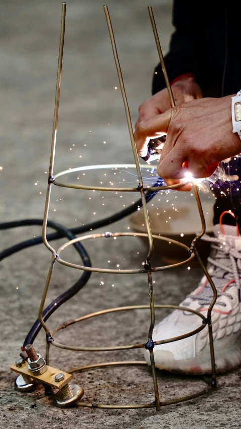 a person using a metal device to test what's on the ground