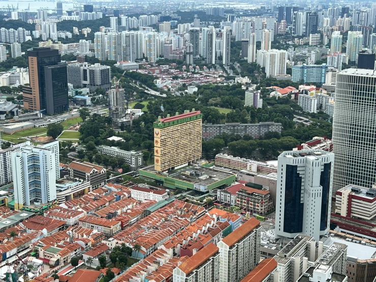 an aerial view of several residential buildings near some tall buildings