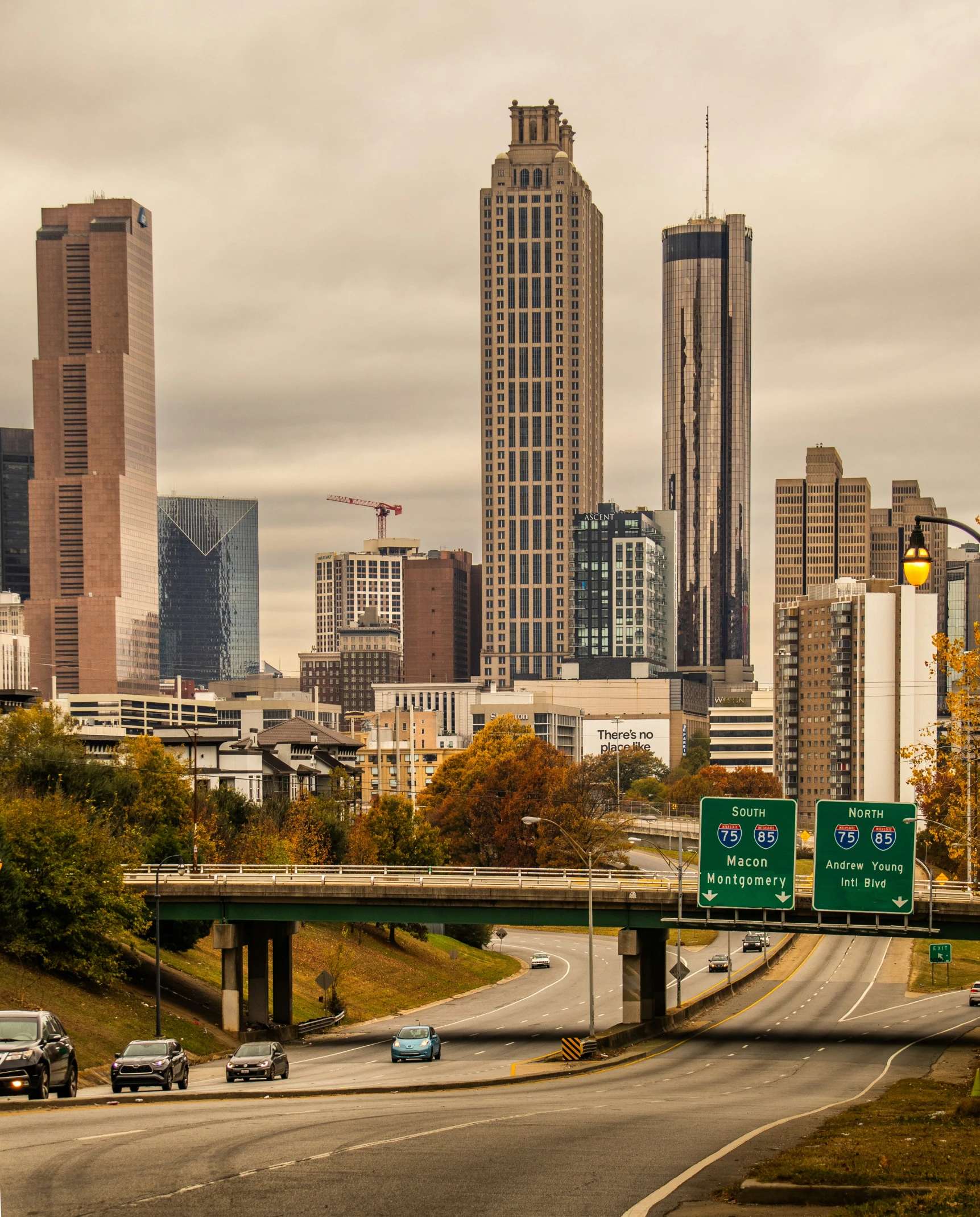 this is a freeway in the city that has tall buildings