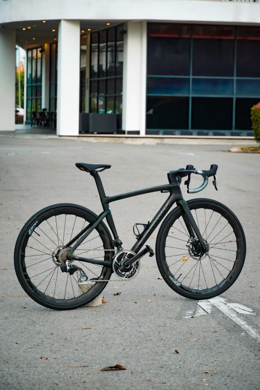 this is a bike standing on the pavement