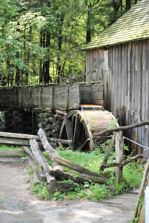 an old mill with its water casing out