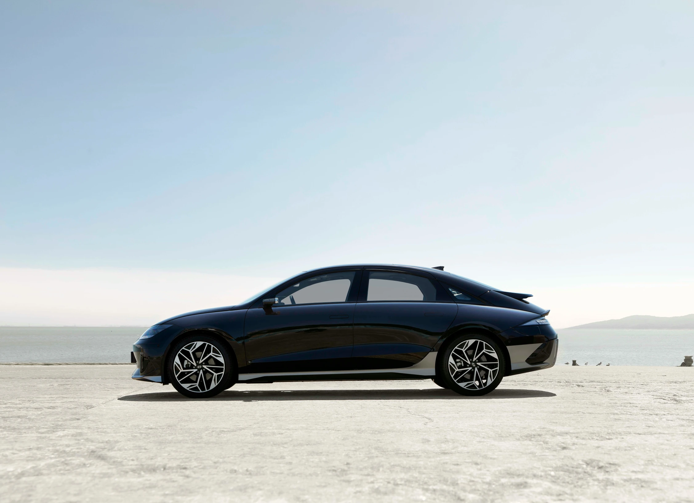 the bmw i8 driving on the beach