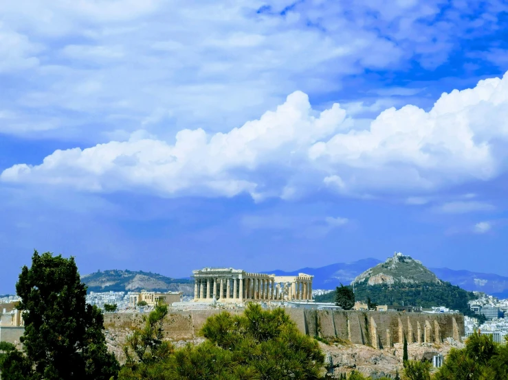 the ancient acrobatic temple atop a hill with many trees