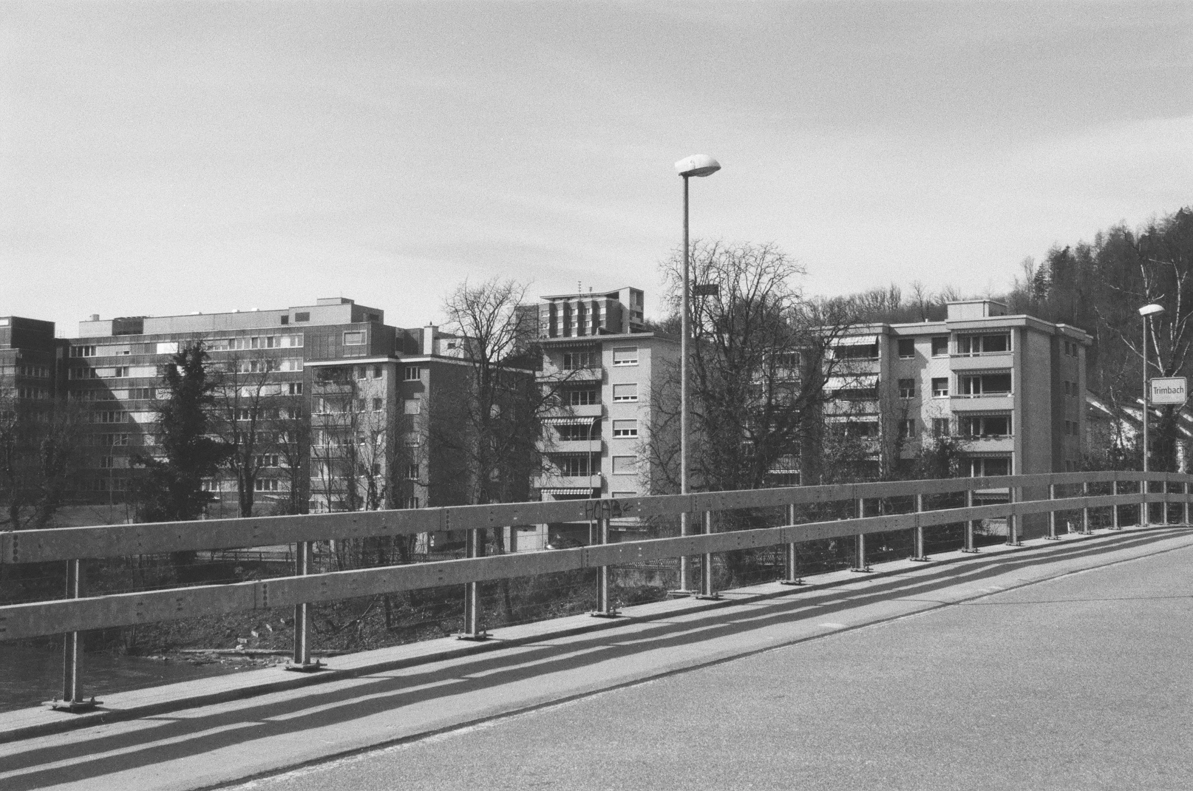 a black and white po of a building and a street