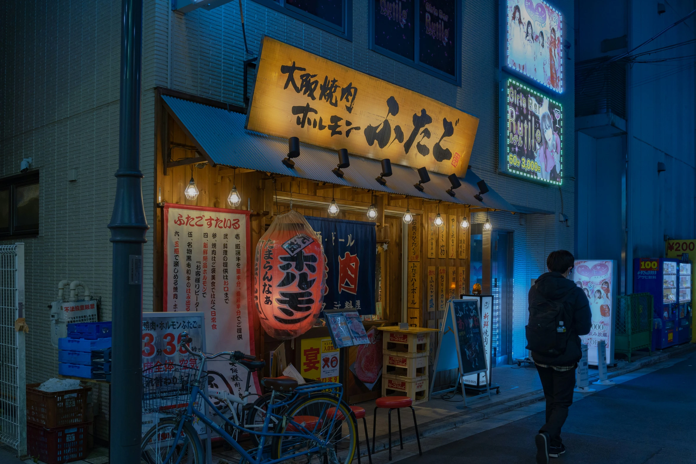 a man walks past a store on the sidewalk