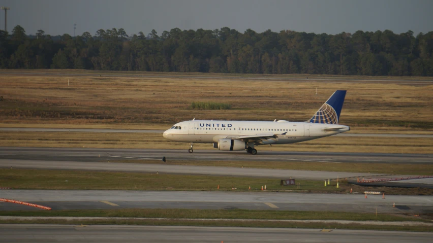 a united airlines plane preparing for take off