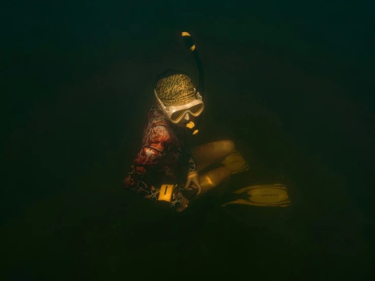 two people in the dark water, holding onto their life buoys