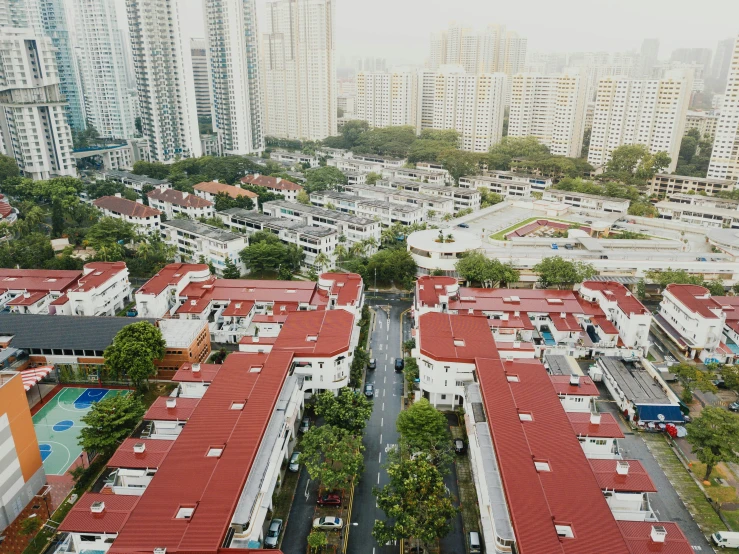 an aerial view of a city surrounded by tall buildings