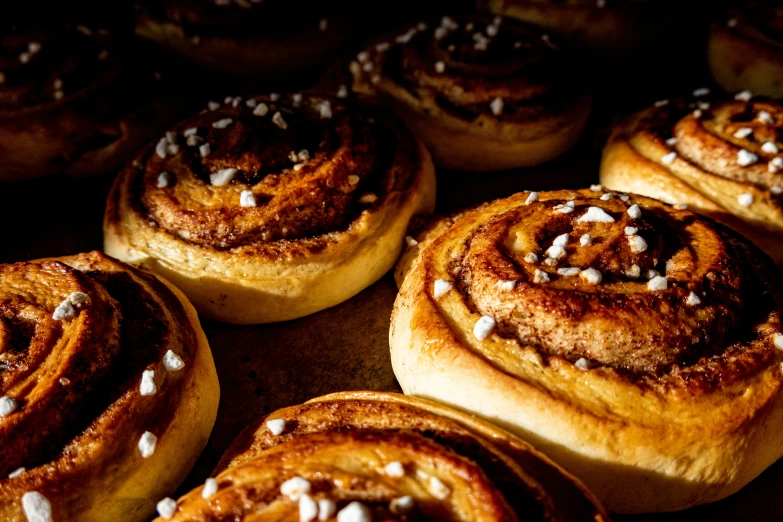 the doughnuts are stuffed with chocolate and white sprinkles