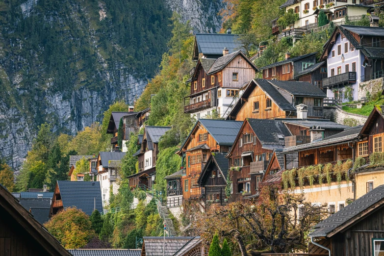 many houses stand on the hillside beside each other