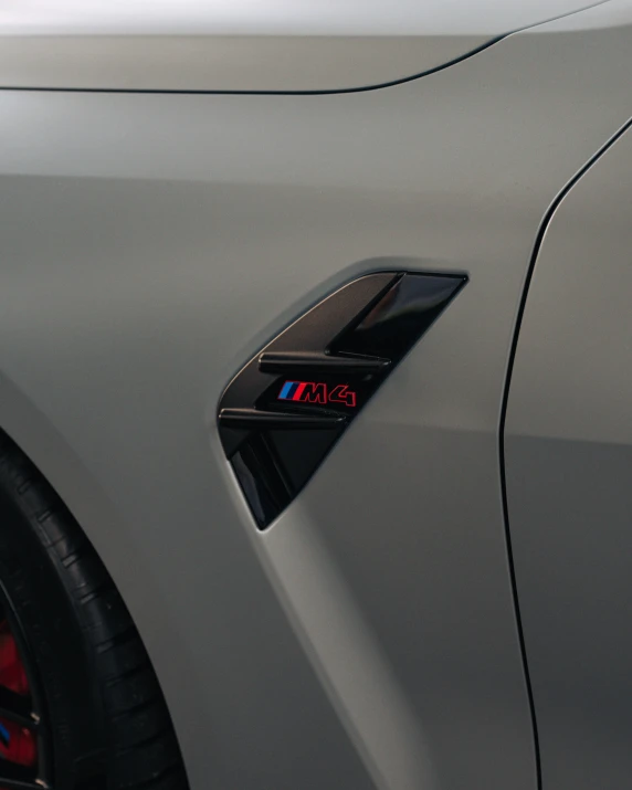 the bmw emblem is on a car's rear door