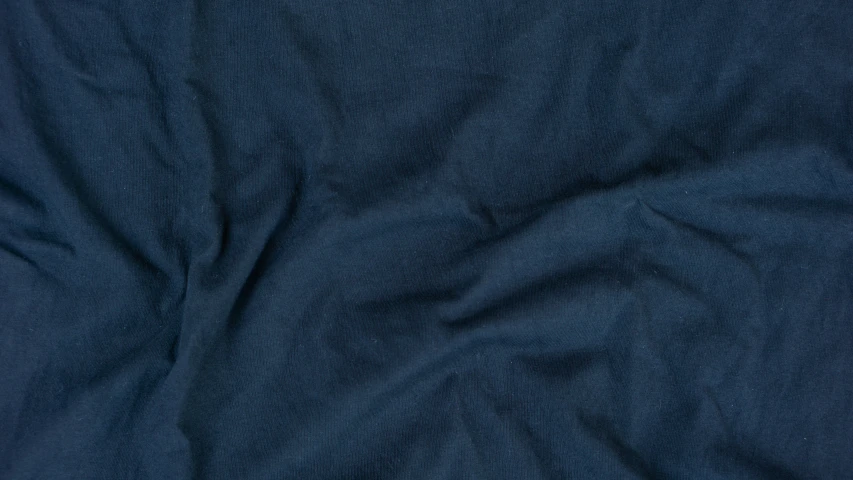 the back side of a blue fabric material