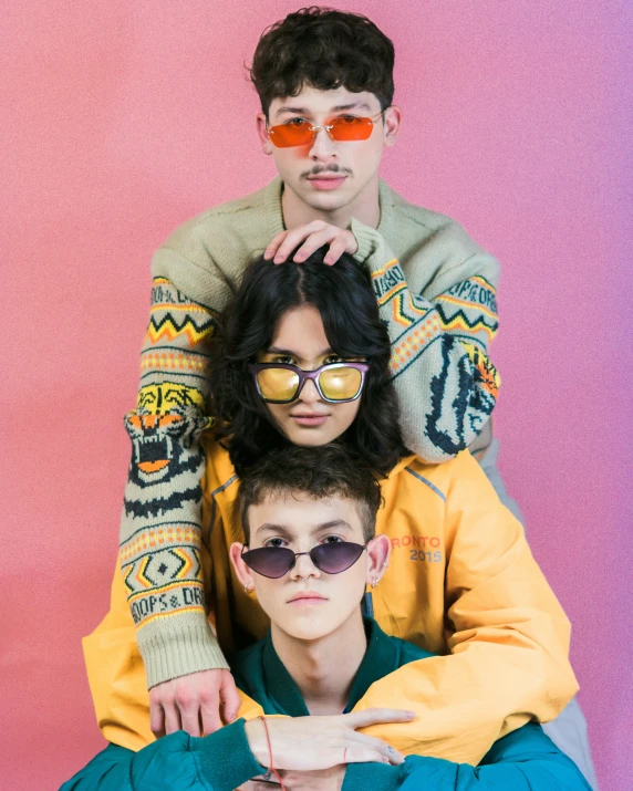 a man is posing with his back to another person wearing sun glasses