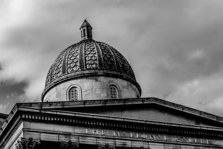 a very tall dome with the name of a building