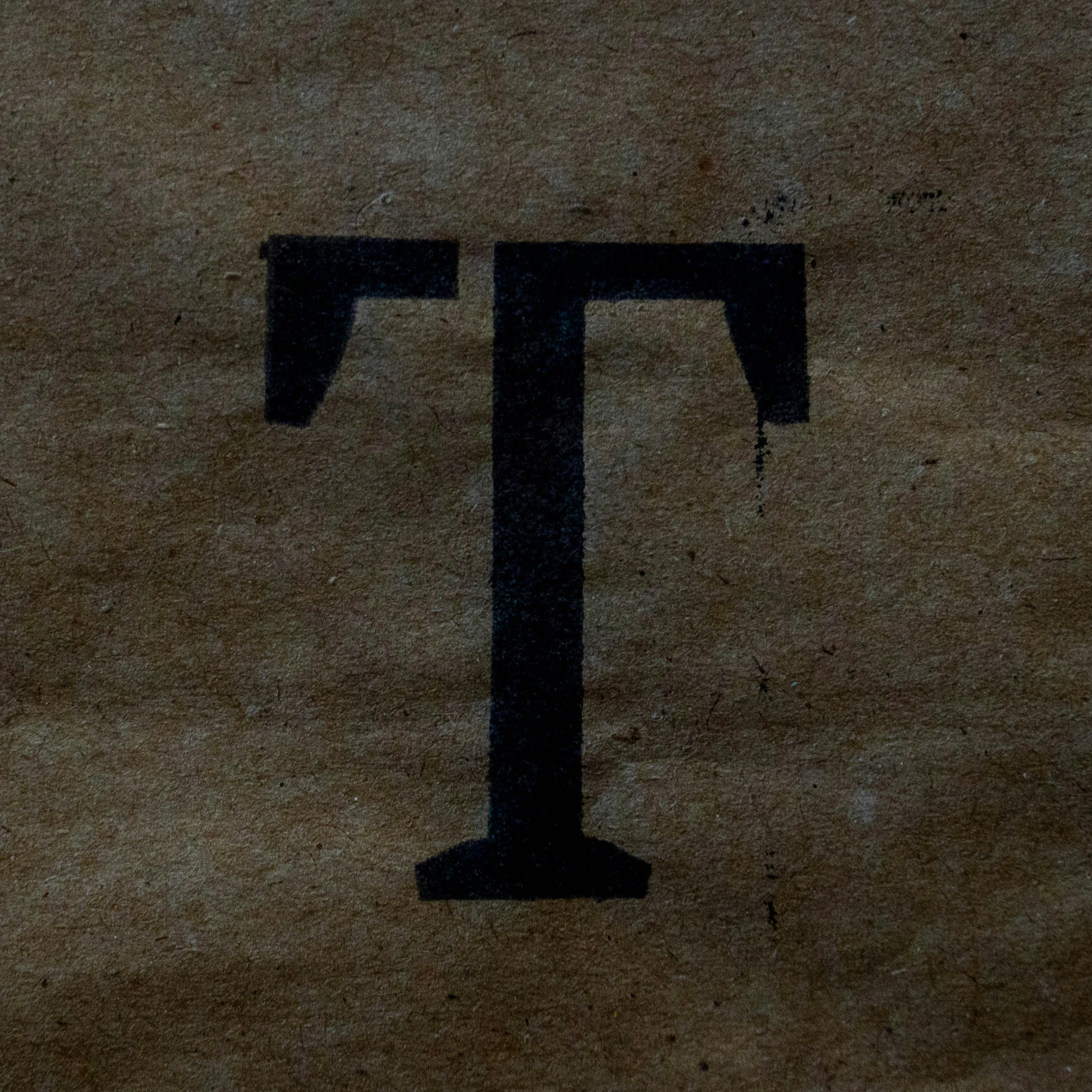 a black and white drawing of a t in the ground