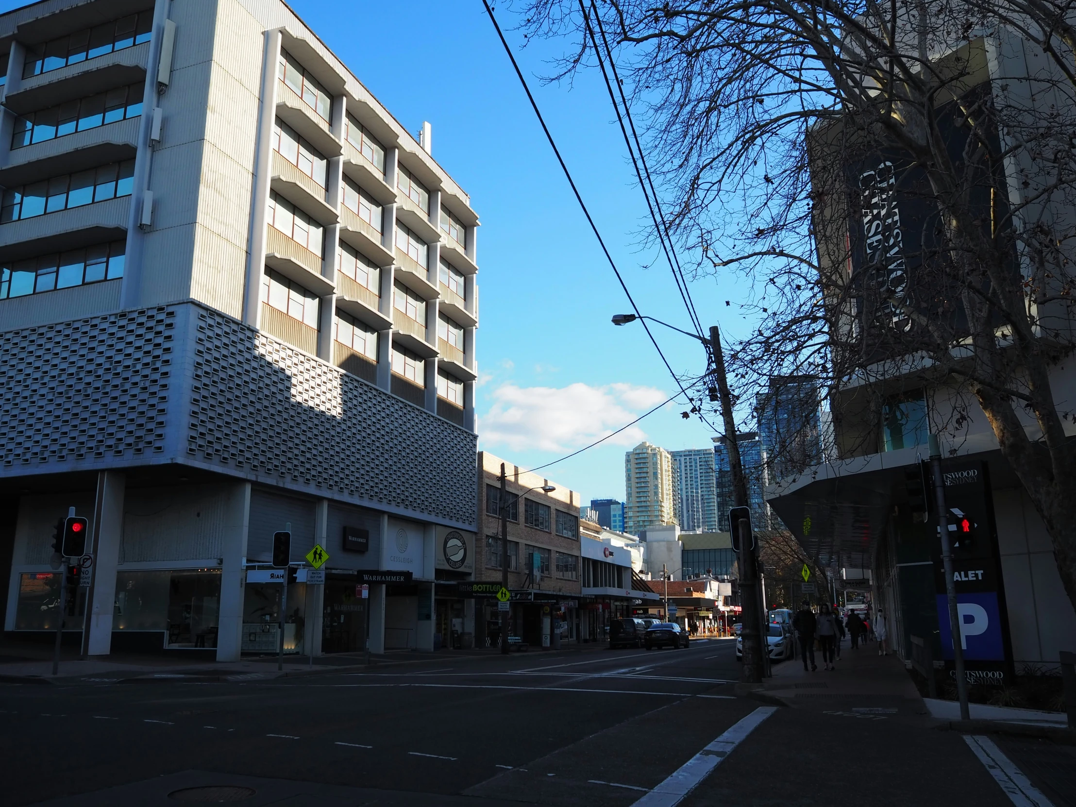 a city street that is lined with buildings