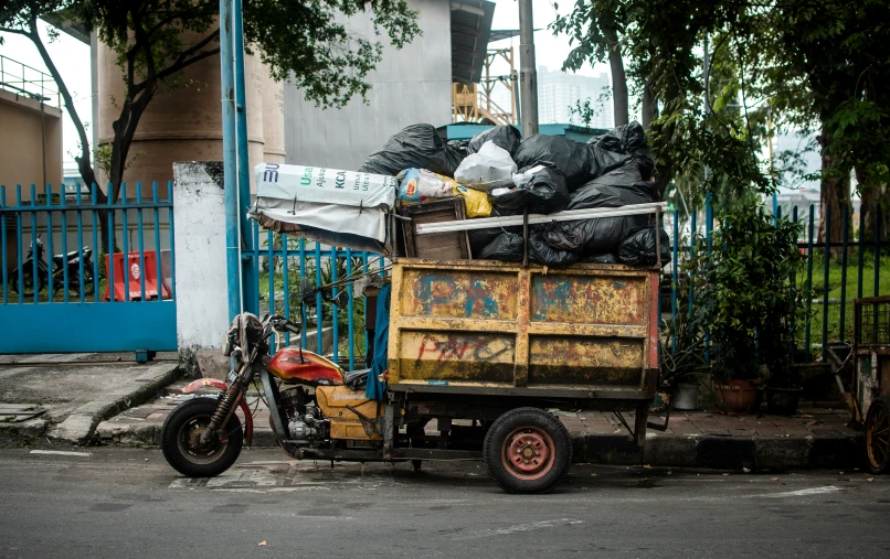 a bike is parked outside near a truck