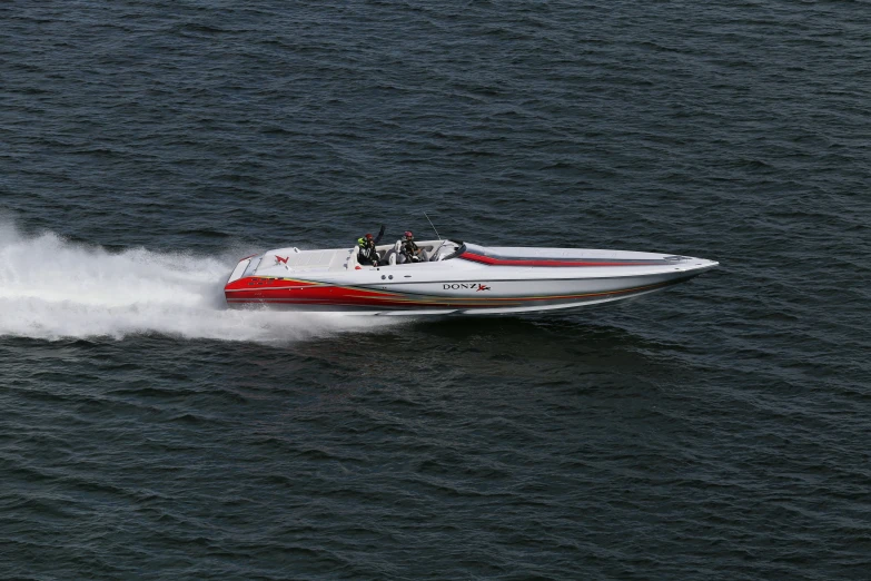 a speed boat speeding across the water