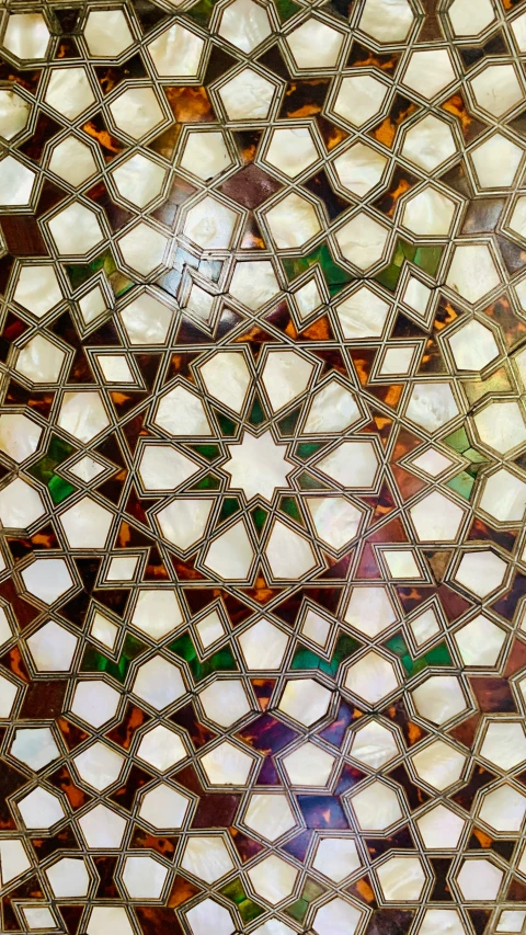 an artistic glass wall pattern that looks like a building