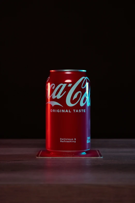 red can with coca - cola nd logo lit up