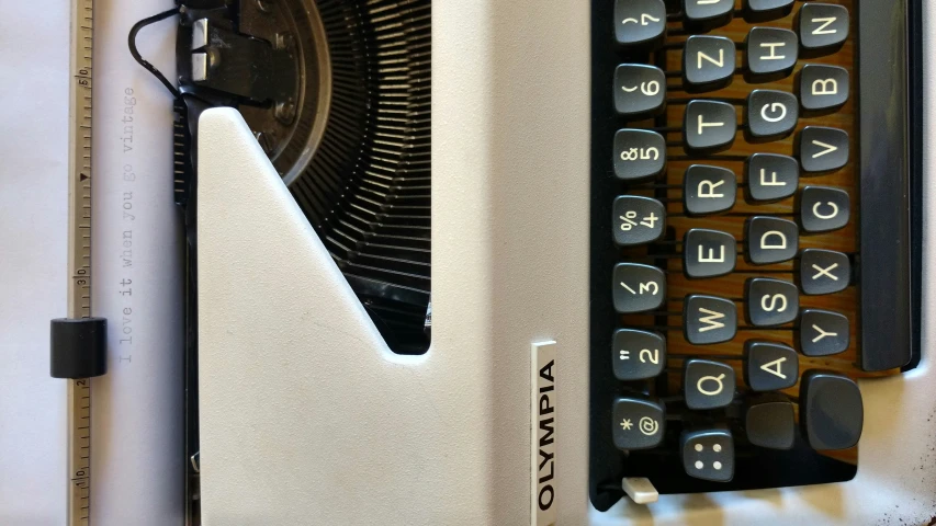 a typewriter that has a keyboard in it