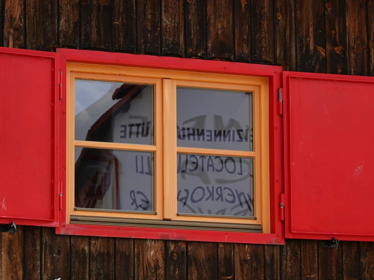 a close up of a window with writing on it