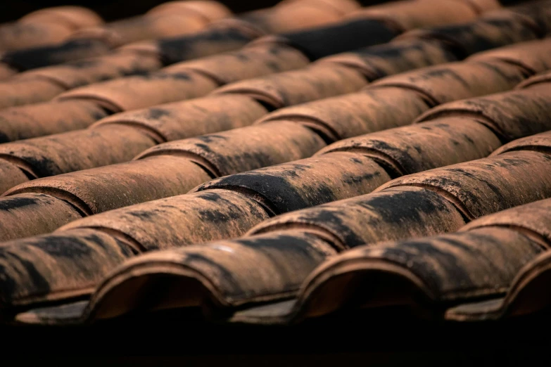 a stack of roof tiles with an overlay of some sort of structure