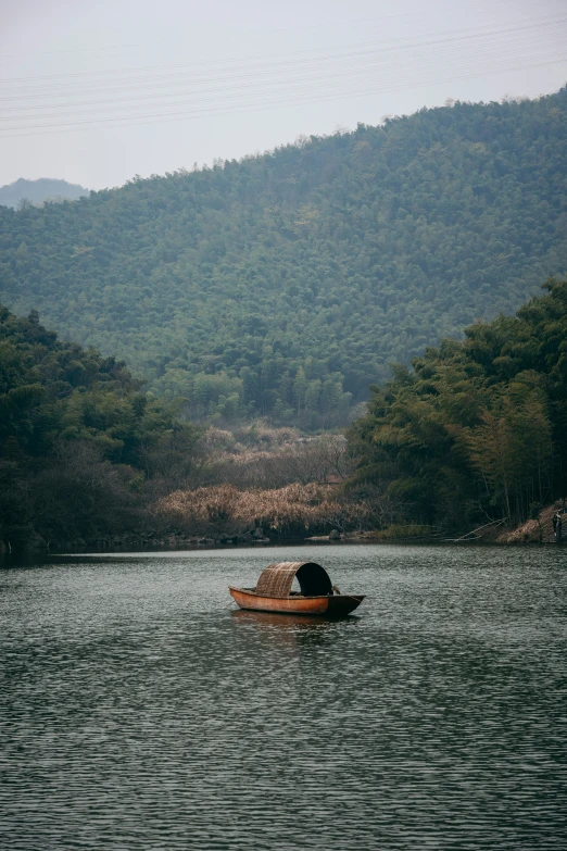 people on small boats on a body of water