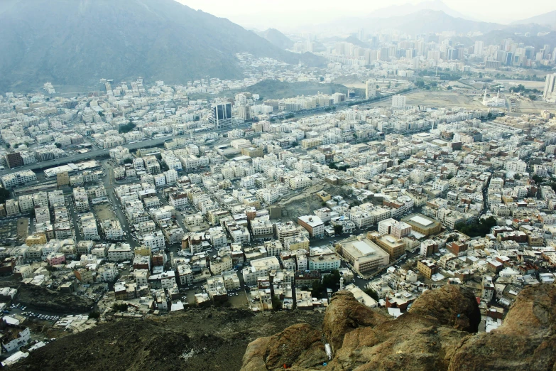 this cityscape shows that many buildings are built along the land