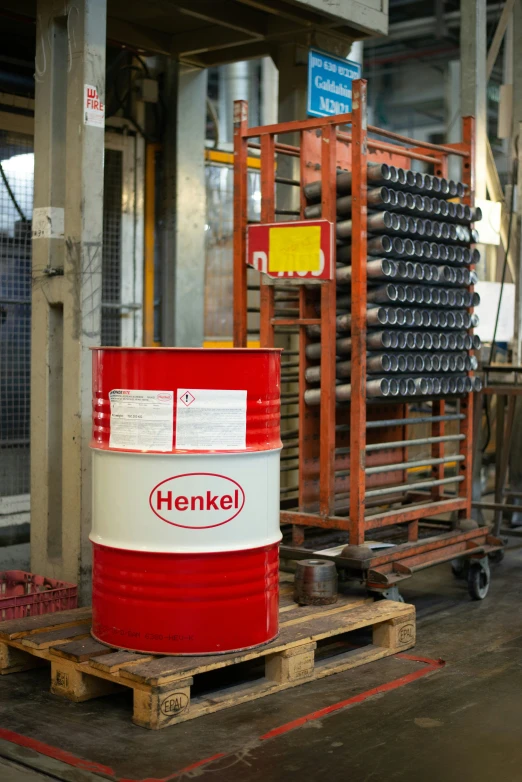 an image of barrels on a pallet in a factory