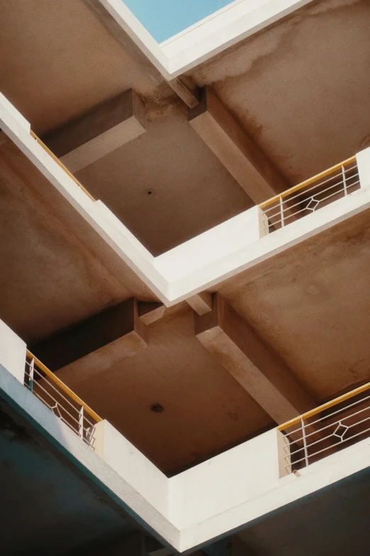 three balconies and two balcony railings connected to each other