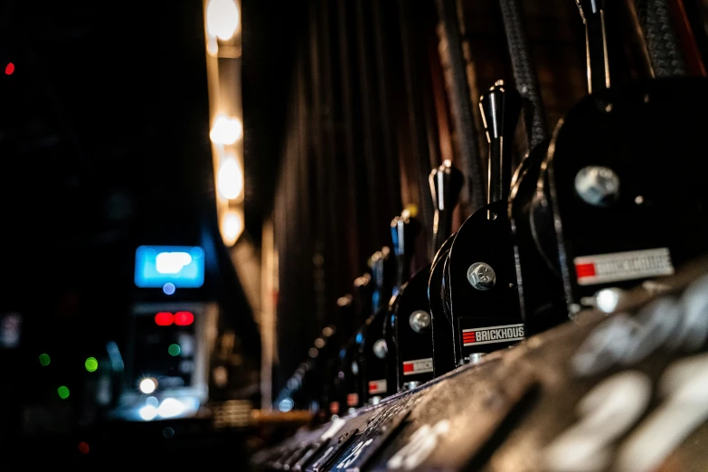 a lot of bottles sitting on the side of a wall