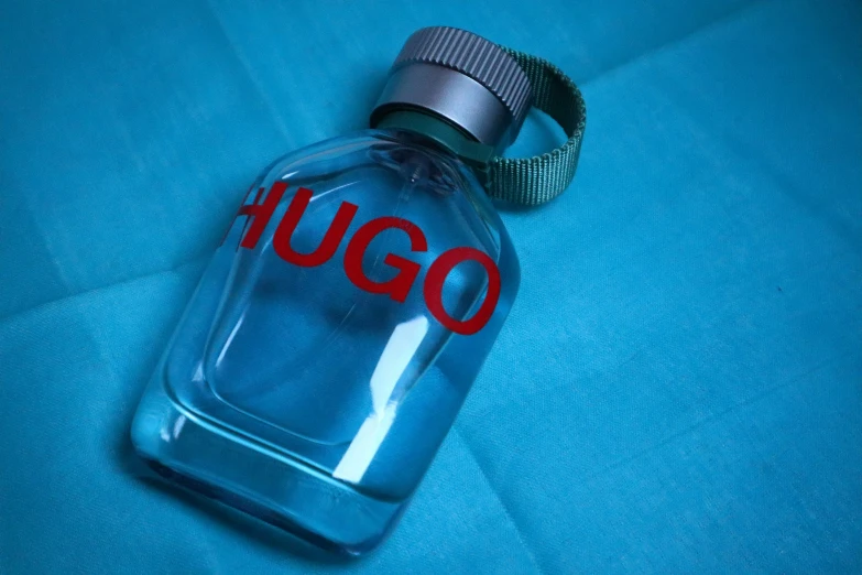 the bottle is empty on the table with the name gugo