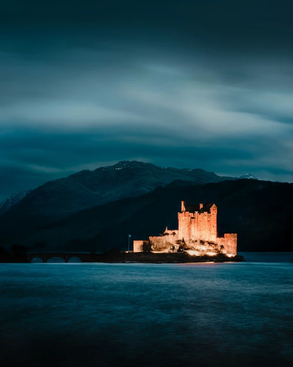 an image of a castle in the dark