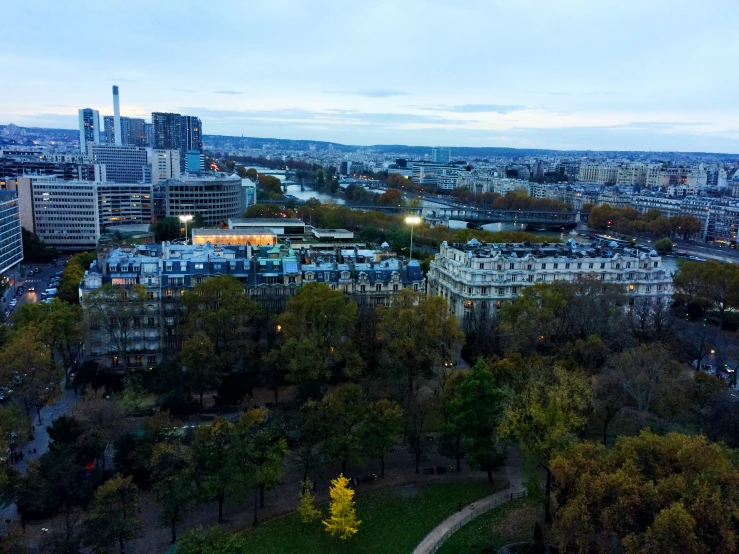 aerial view of a city at dusk from above