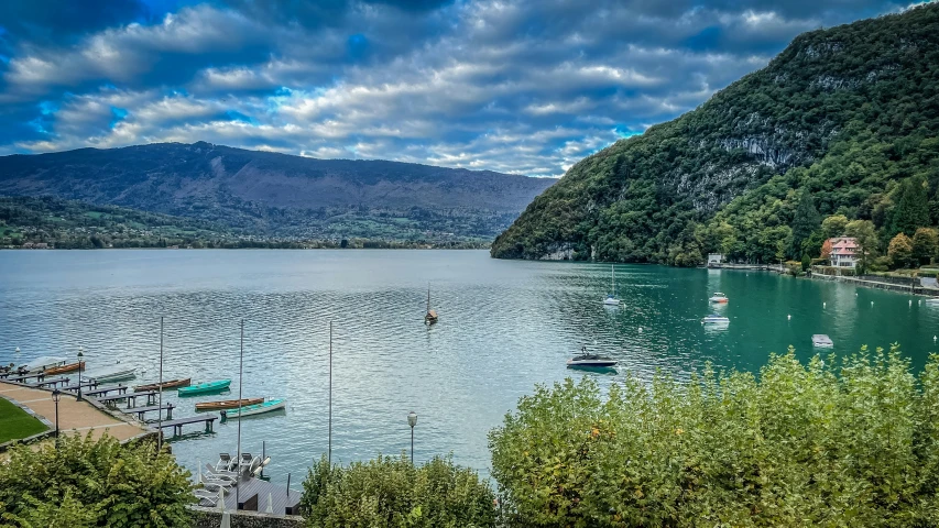 an aerial s of the mountains and a lake