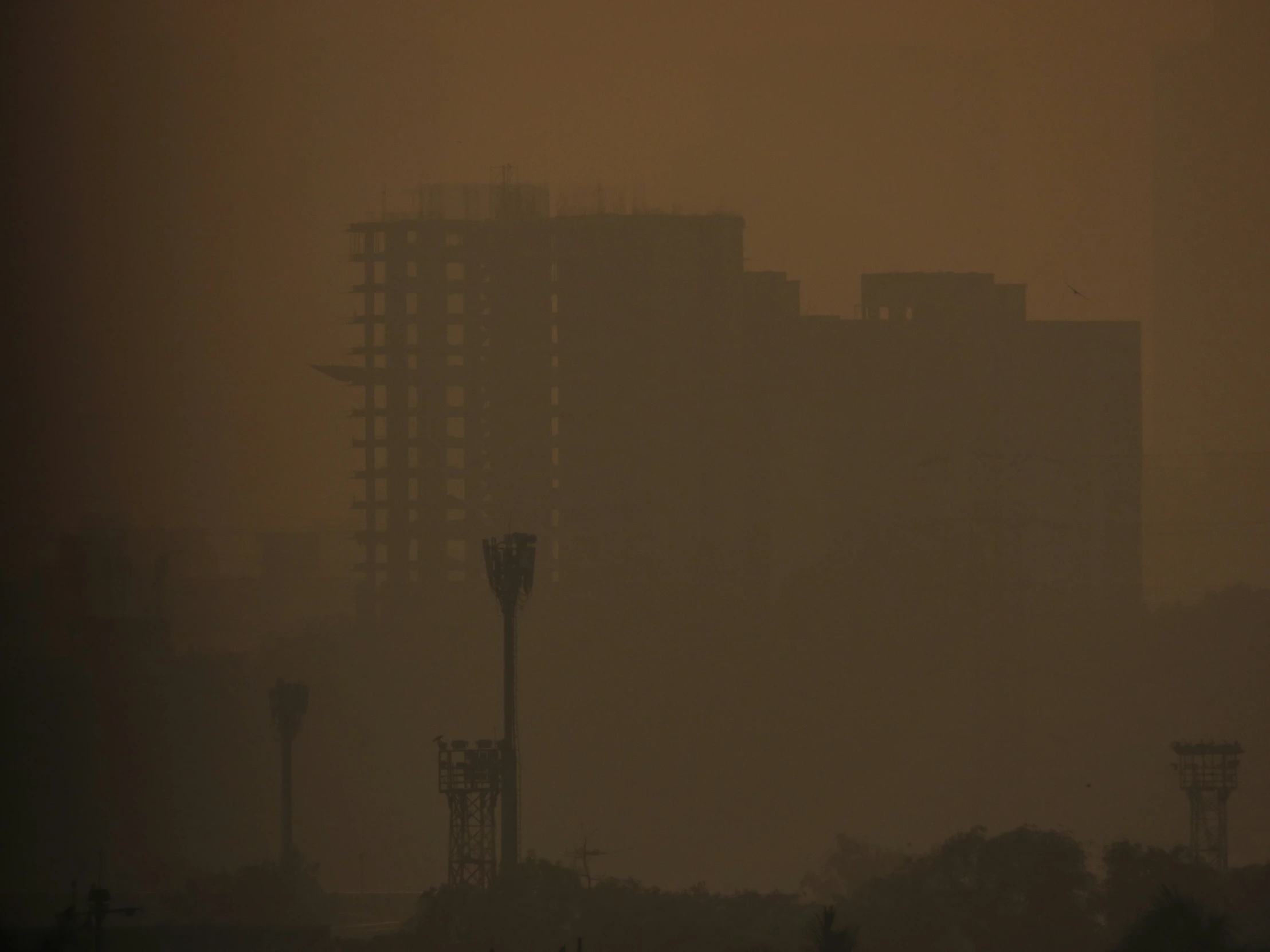 the building is covered in dust and fog