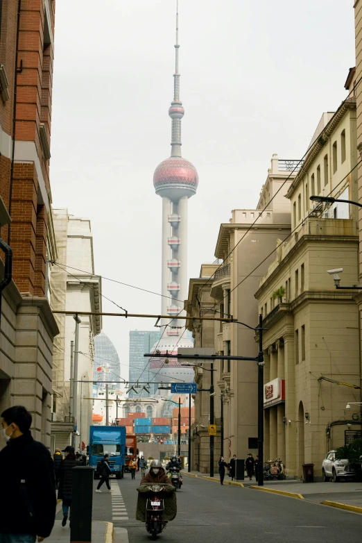 a city street has many people on it