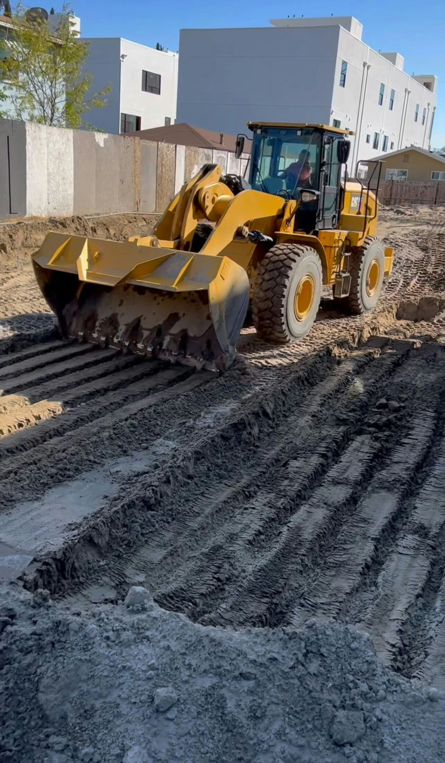 a construction machine that is sitting in the dirt