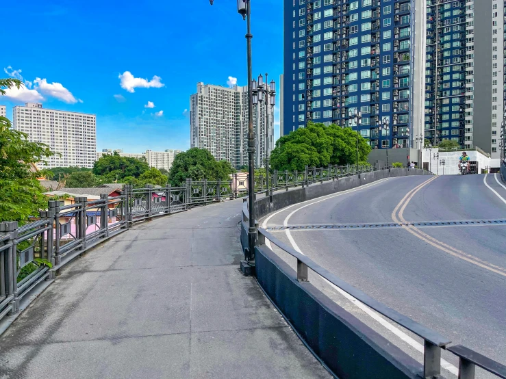 a picture of a road by some buildings