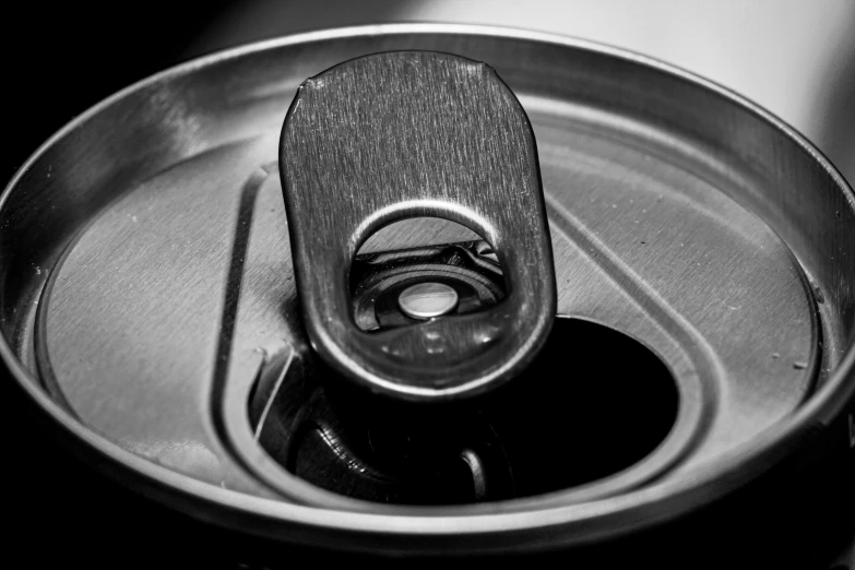 a can with an opening has water in it