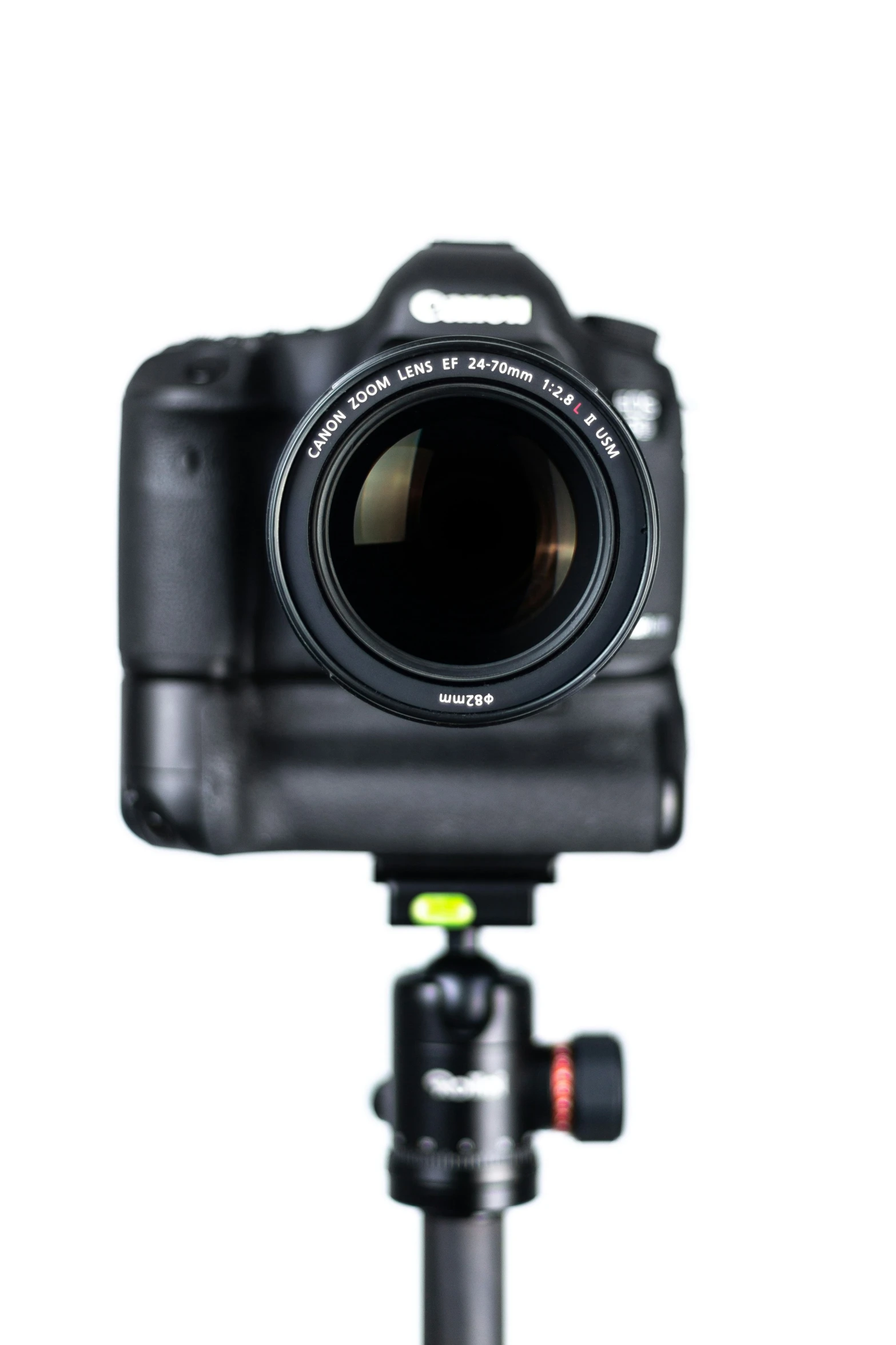 a close up of a camera with a microphone on a tripod