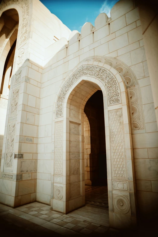 an archway on the outside wall of a building